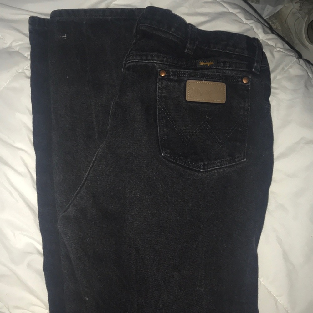Men’s wrangler black jeans, never worn.